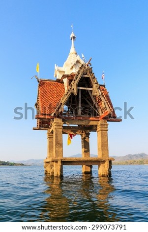 Underwater city flooding temple at Kanchanaburi, Thailand.