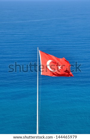 Flag of Turkey against the sea