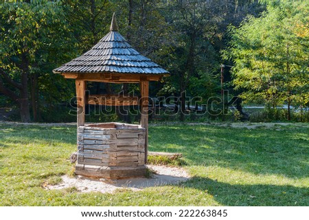 old wooden a well in village