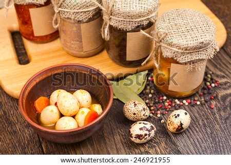 canned quail eggs  and canned food in glass still life