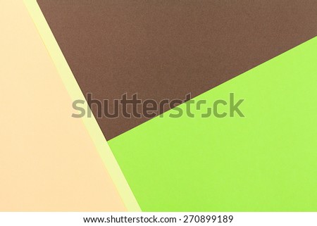 Color papers geometry flat composition background with green and brown tones