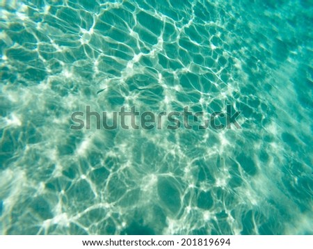 Water reflection/Transparent sea water. Clean water. Sand in sea.