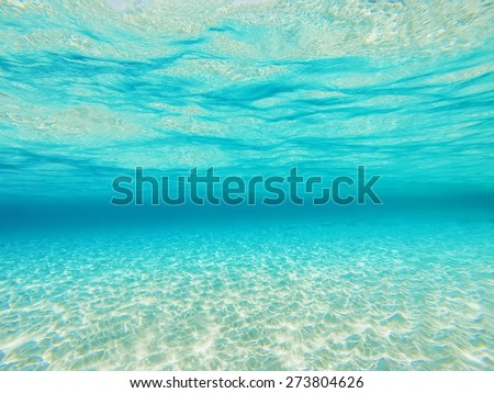 Defocused underwater sea background. Blue transparent turquoise water/Defocused underwater background
