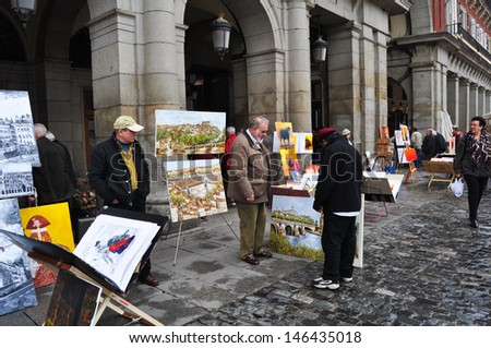 MADRID, SPAIN - MARCH 21: Painting sellers in Madrid on march 21, 2010 in square Mayor.
