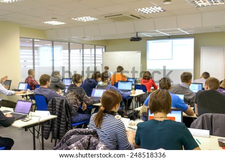people sitting rear at the computer class