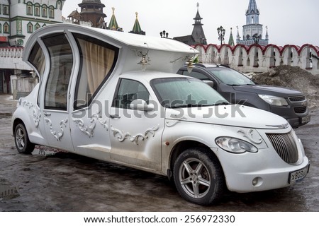 MOSCOW FEBRUARY 28: Vintage wedding car decorated as a carriage on the 28 february 2015 in Izmailovo Kremlin, Moscow, Russia