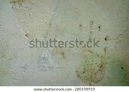 grunge wall texture decorated with print of hand