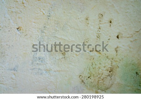 grunge wall texture decorated with print of hand
