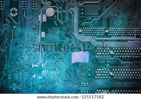 Circuit board toned into dark blue, with diverging diamonds. Motherboard digital chip. Tech science background. Integrated communication processor. Information engineering component.
