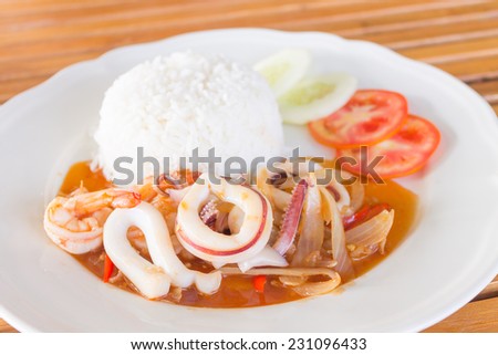 squid and prawns fried with chilies , Thai food