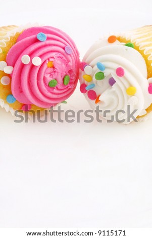 Two mini cupcakes on a white background