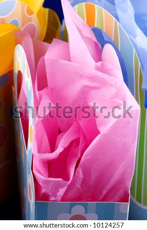 tissue paper filled spring colored gift bags