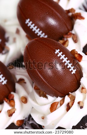 cupcakes with plastic footballs on them.  Good for super bowl or Father\'s Day celebration