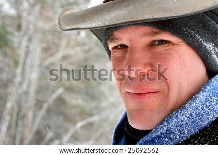 Attractive, middle-aged man bundled against the cold. Room for copy space.