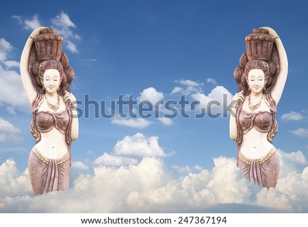 Woman statue with cloud and blue sky, Travel concept