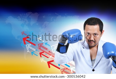 businessman with boxing glove ready to fight, business concept