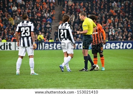 DONETSK, UKRAINE - DEC 5: Pirlo talking with the referee in the Champions League match between Shakhtar vs Juventus, 5 December 2012, Donbass-Arena, Donetsk, Ukraine