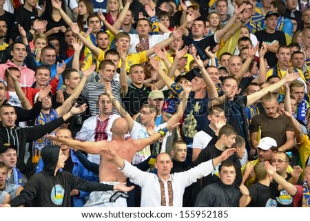 KIEV, UKRAINE - SEP 10: Ultras Ukraine team at the stadium during the qualifying match 2014 World Cup between Ukraine vs England, 10 September 2013, NSC Olympic Stadium, Kiev, Ukraine