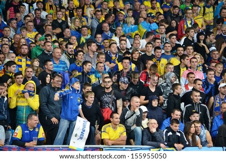 KIEV, UKRAINE - SEP 10: Fans of the national team of Ukraine during the qualifying match 2014 World Cup between Ukraine vs England, 10 September 2013, NSC Olympic Stadium, Kiev, Ukraine