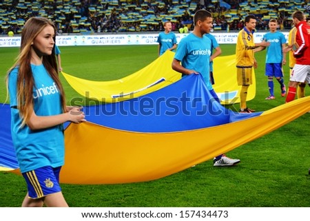 KIEV, UKRAINE - SEP 10: National flag of Ukraine during the qualifying match 2014 World Cup between Ukraine vs England, 10 September 2013, NSC Olympic Stadium, Kiev, Ukraine