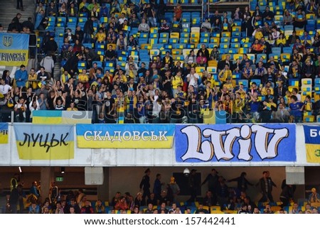 KIEV, UKRAINE - SEP 10: Fans of the Ukrainian team at the stadium during the qualifying match 2014 World Cup between Ukraine vs England, 10 September 2013, NSC Olympic Stadium, Kiev, Ukraine