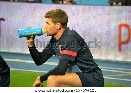 KIEV, UKRAINE - SEP 9: Steven Gerrard drink water for the pre-match training session before the qualifying match 2014 World Cup, 9 September 2013, NSC Olympic Stadium, Kiev, Ukraine