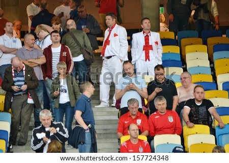KIEV, UKRAINE - SEP 10: England fans in the stands before the qualifying match 2014 World Cup between Ukraine vs England, 10 September 2013, NSC Olympic Stadium, Kiev, Ukraine