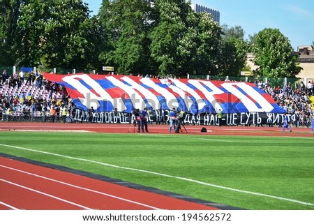 CHERKASSY, UKRAINE - MAY 7: Ultras stretched canvas titled former team during the semifinal match of the Cup of Ukraine on football between Slavutich - Shakhtar Donetsk, 7 May 2014, Cherkassy, Ukraine