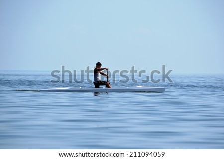 CHERKASSY, UKRAINE - AUG 8: Rowing in VI International swim across the Dnieper River, 10 km, 8 August 2014, Cherkassy, Ukraine