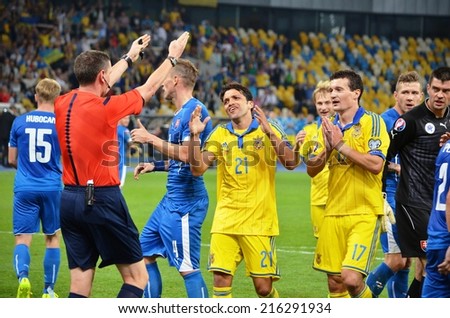 KIEV, UKRAINE - SEP 8:Ukrainian team argues with the referee\'s Craig Thompson decision during the match Ukraine 0-1 Slovakia UEFA Euro 2016 qualifier match at the Olympic stadium