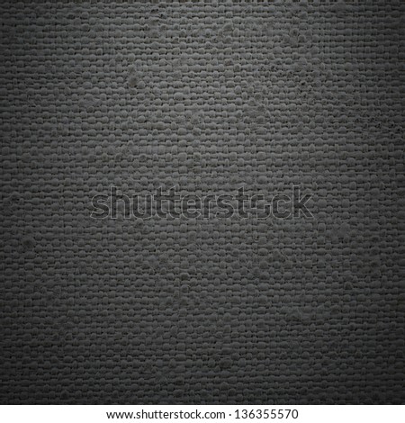 close up macro of black linen material garment texture or background