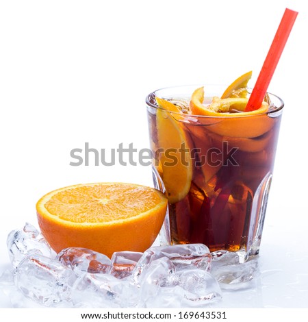 Cold cocktail with orange fruit over white background