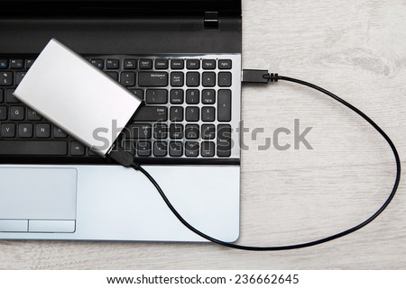 External HDD over laptop keyboard