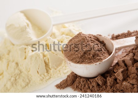 Close up of protein powder and scoops