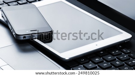 Close up of laptop, tablet and smartphone