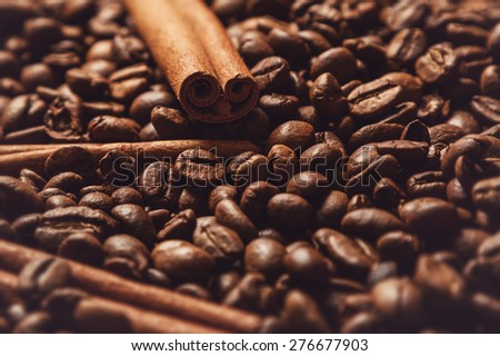 Close up of cinnamon sticks and coffee beans