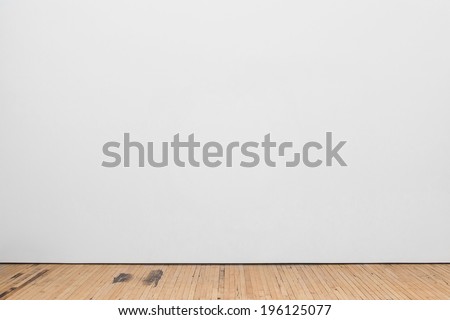 Blank White Museum Wall With Wooden Floor