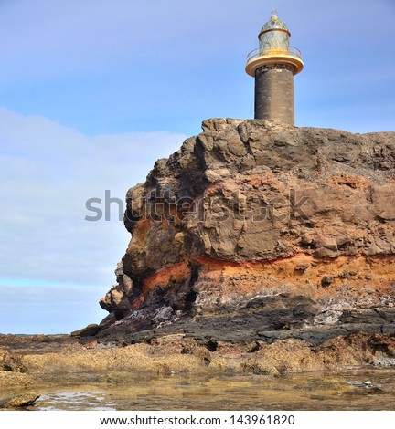 Stone lighthouse in tip of Jandia, coast of Fuerteventura, Canary islands, Spain