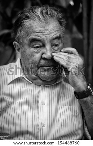 Old man crying