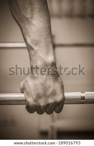 hand on the training bar