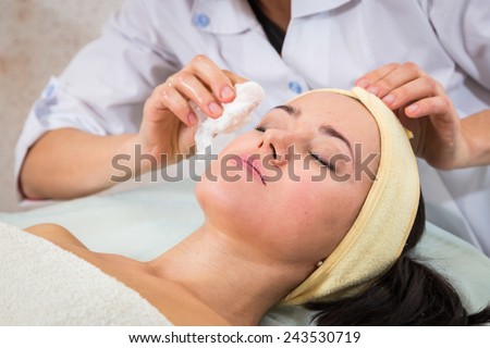 Beauty treatments in the beauty salon. Beautician revitalizing facial. Facial massage. Beauty, facial, beautician.