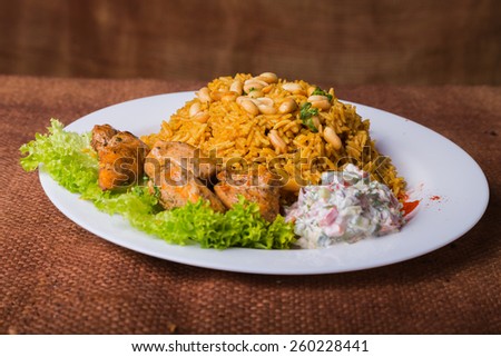 Eastern food. Arab food. Pilaf with meat. Rice with meat and vegetables. Healthy eating, delicious food.