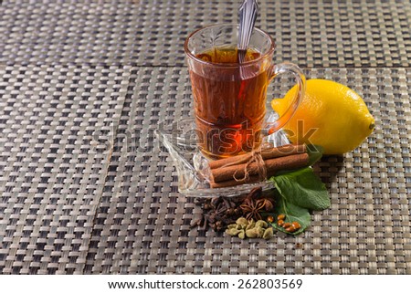 Tea with lemon. Tea on a light background. Warm, delicious tea.