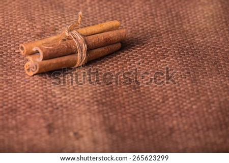 Cinnamon. Several cinnamon sticks on the table. spices