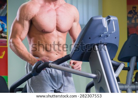 A man runs on a treadmill
