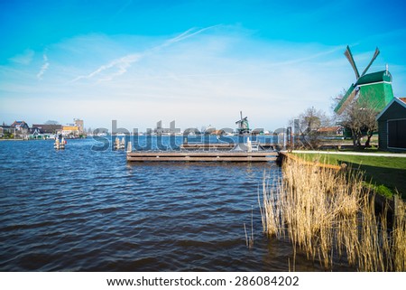 AMSTERDAM, NETHERLANDS - MARCH 16: Canal and houses in Amsterdam. Amsterdam is the capital and most beautiful city of the Netherlands on March 16, 2014