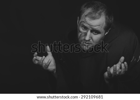 Portrait of the actor in the form of Quasimodo. Theater, stage make-up. Theatrical make-up professionally. Emotional acting.