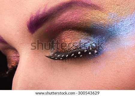Fashion beauty make-up. Makeup with glitter. Art makeup, bright makeup.
