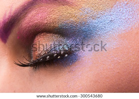 Fashion beauty make-up. Makeup with glitter. Art makeup, bright makeup.