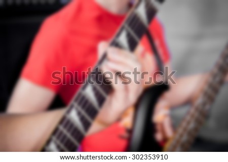Rock band, musician, vocalist, guitarist. blurred Background